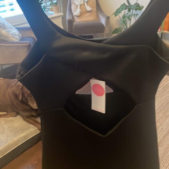 black mini dress with front and back cutouts. - Picture 3 of 5